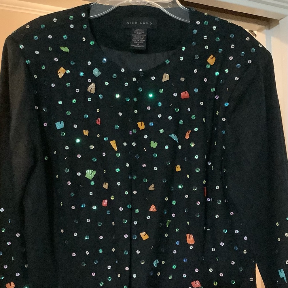 Silkland black lined silk jacket (size S) covered  with polished shells.